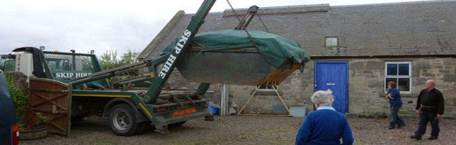 An example of a skip being delivered to a client